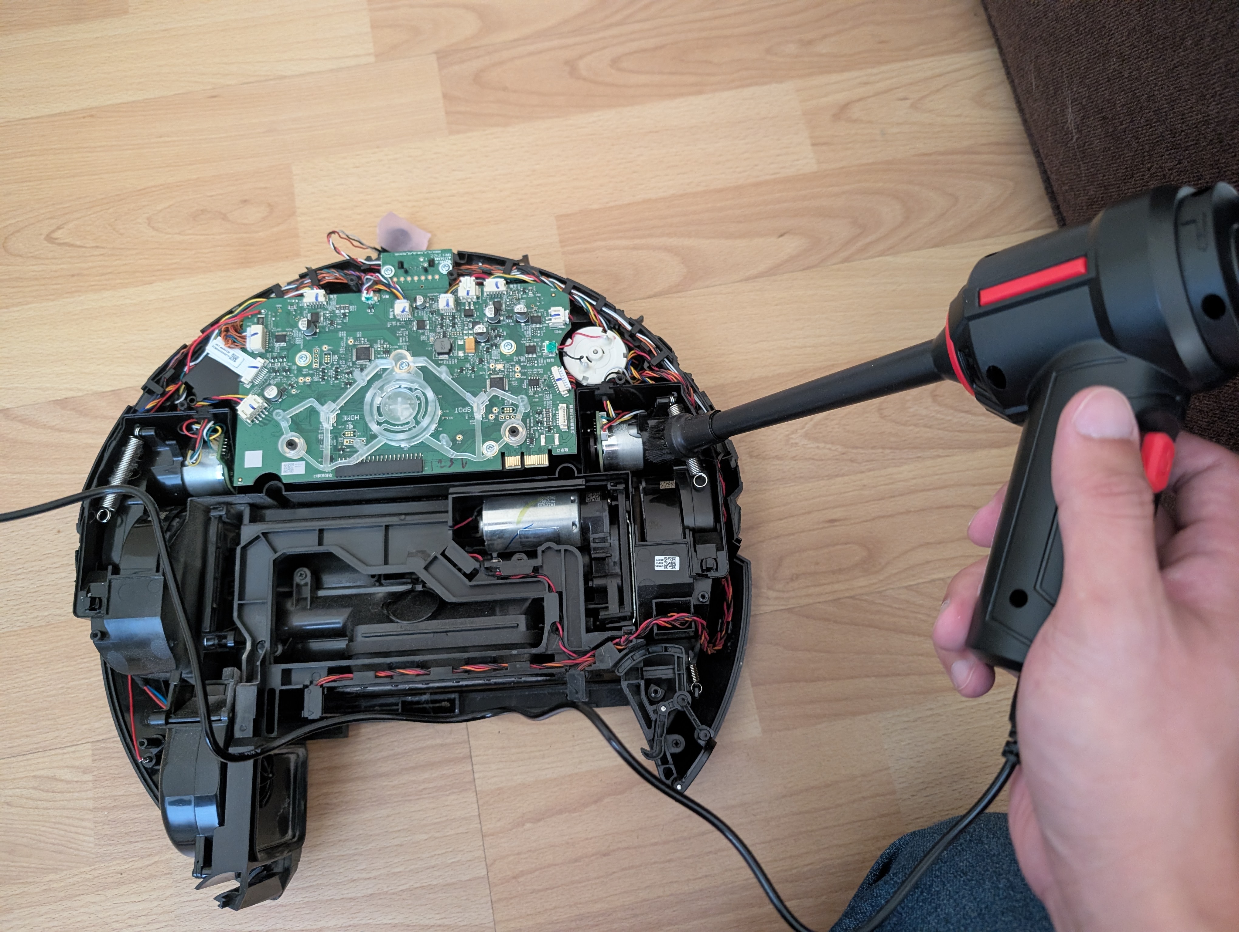Blowing dust off the main board and motor assembly