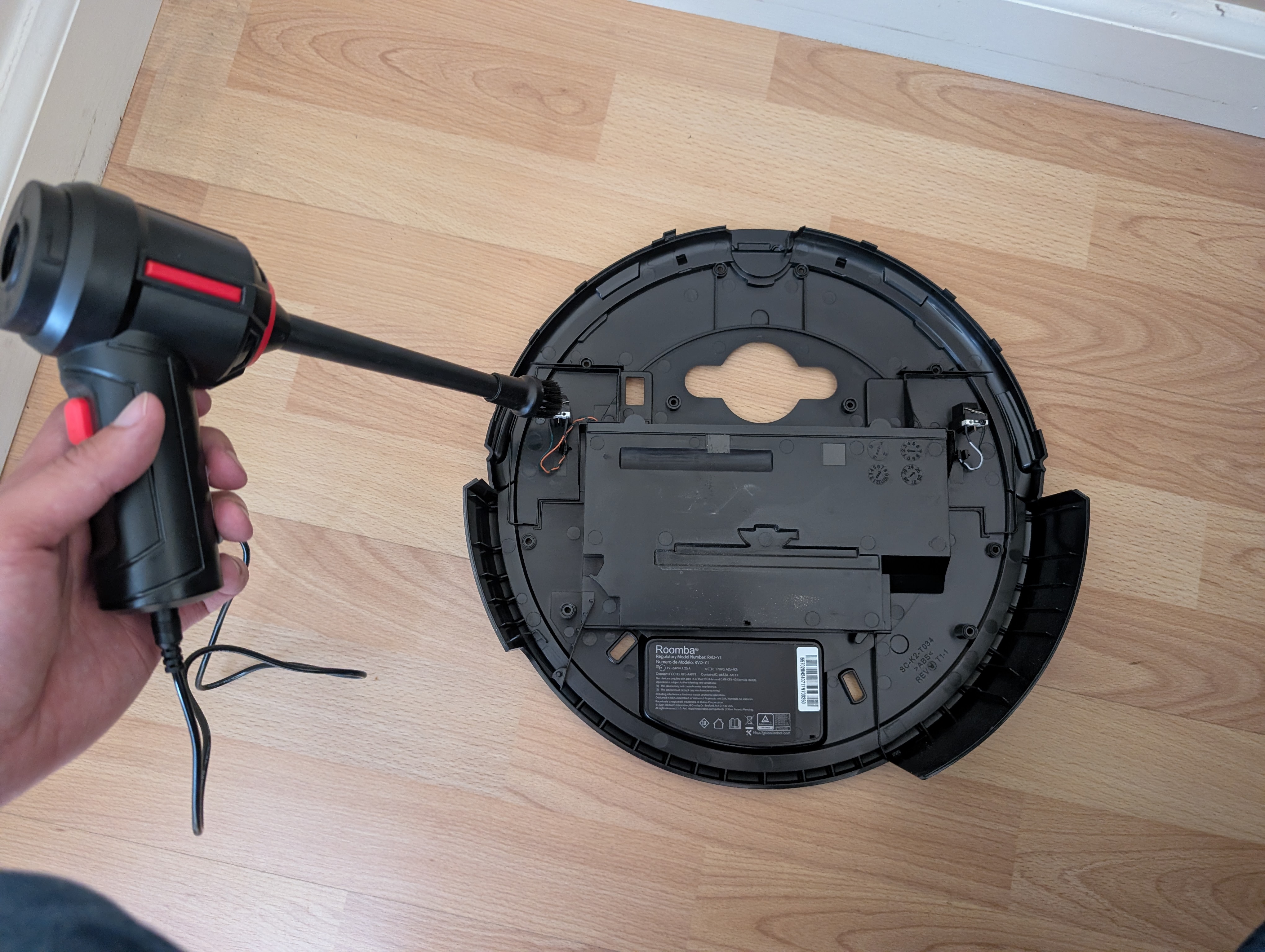 Using a compressed air blower on the top shell near the wheel switch