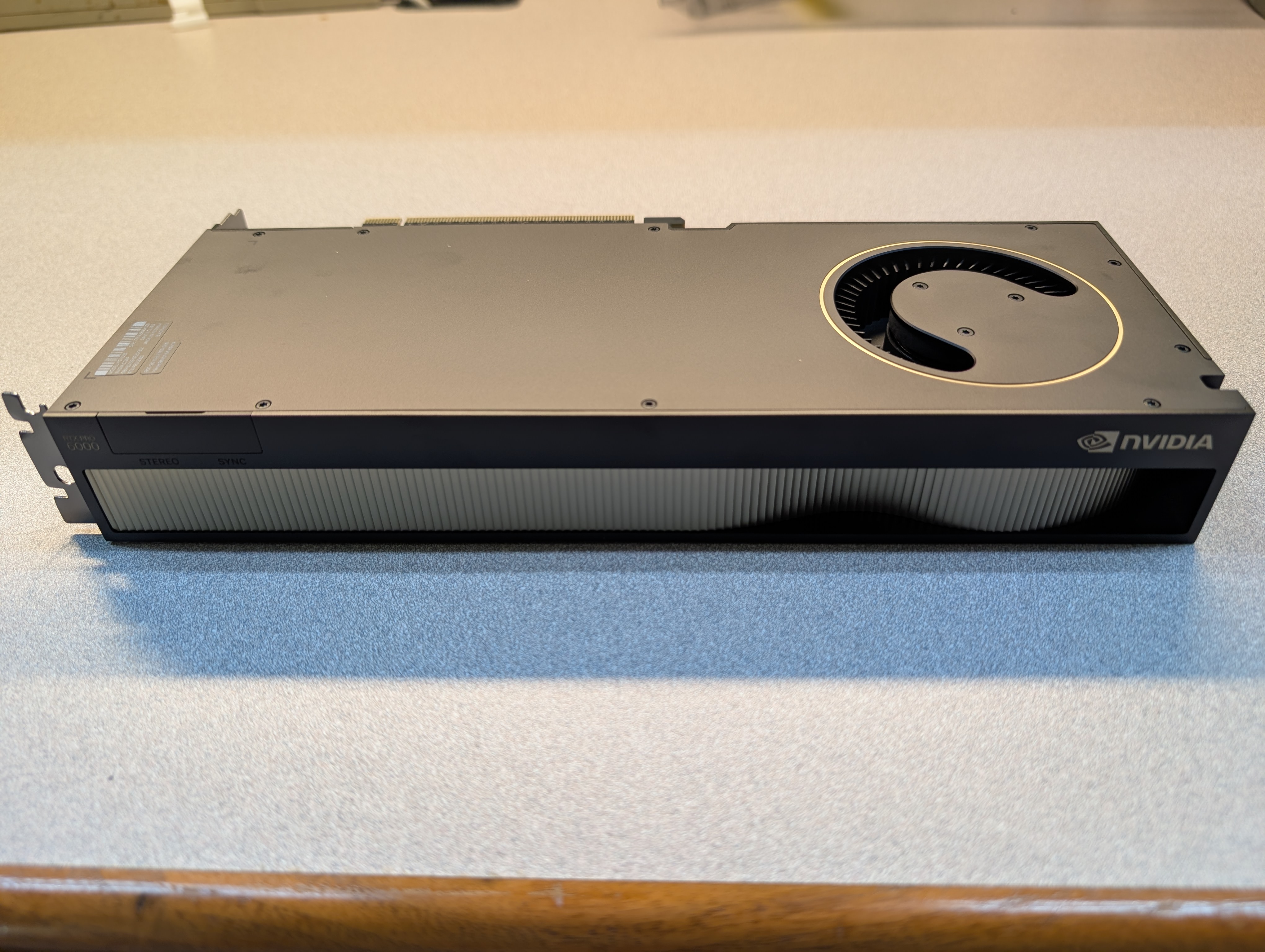 Rear I/O edge of the card showing the NVIDIA logo, STEREO and SYNC connectors
